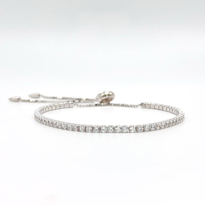 Adjustable tennis bracelet, silver-tone with round rhinestone row and hook clasp