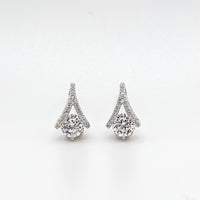 Teardrop diamond stud earrings with prong-set stones, halo and tapered top.