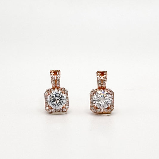 Square stud earrings with rose-gold setting and square-cut clear center stones
