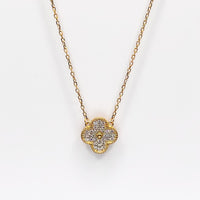Gold-tone 4-leaf clover pendant necklace with glittering crystal-like details