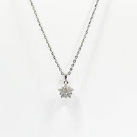 Dainty silver-tone necklace with snowflake charm pendant on link chain