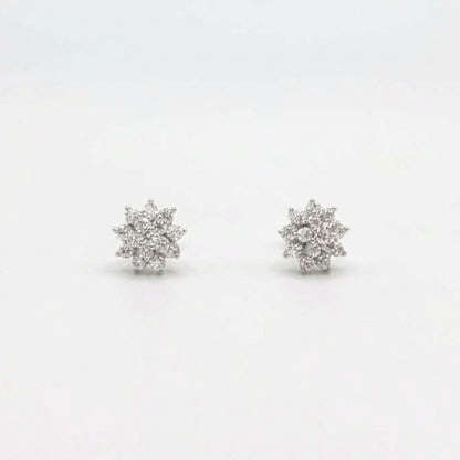 Sterling silver starburst stud earrings, front view pair