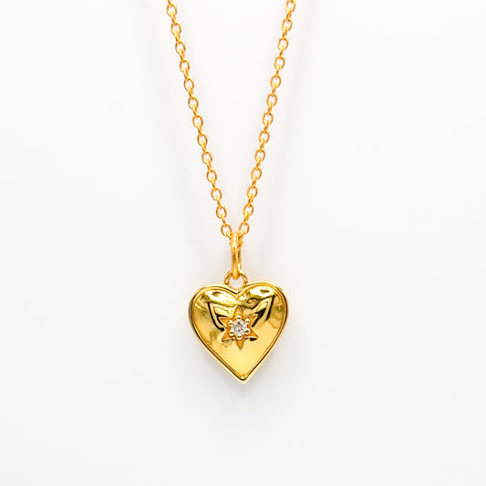 Gold vermeil heart pendant necklace with star centerpiece and dainty chain links