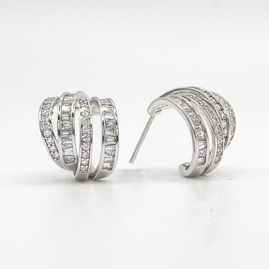 Chunky sterling silver half hoop earrings with pavé crystal rows