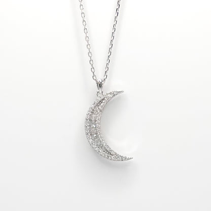 Silver crescent moon pendant necklace with sparkling pave details and chain
