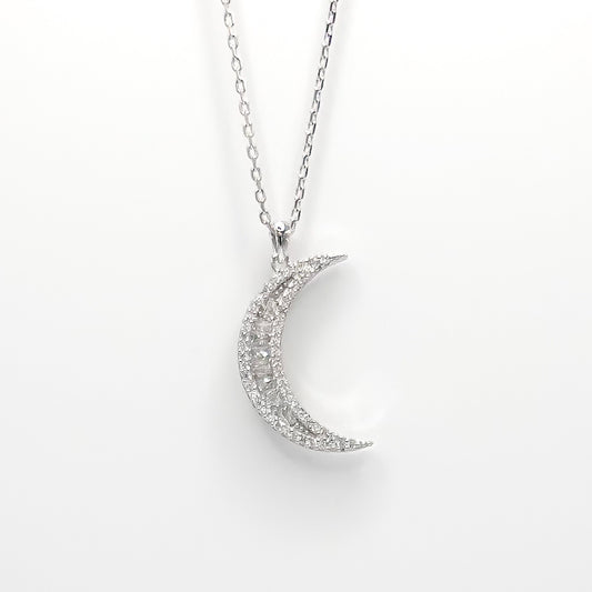 Silver crescent moon pendant necklace with sparkling pave details and chain
