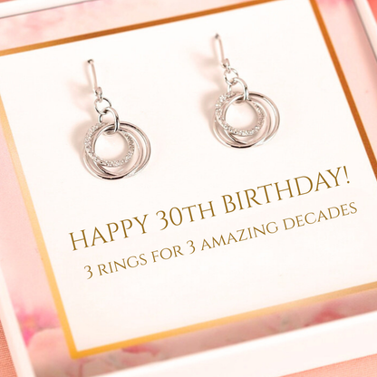 Silver hoop drop earrings with layered ring pendant, pair on display card