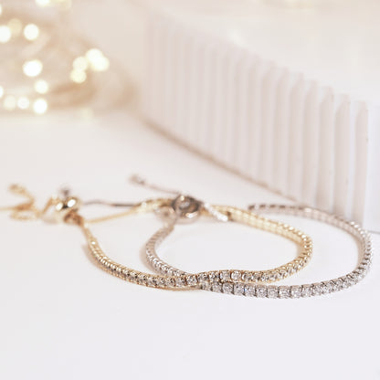 Adjustable silver tennis bracelet with pave stones and linked chain ends