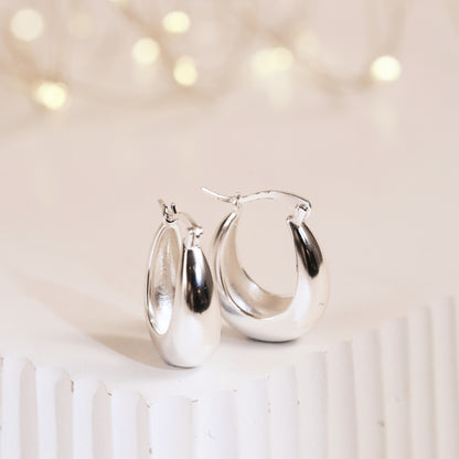 Silver chunky hoop earrings with thick oval hoops