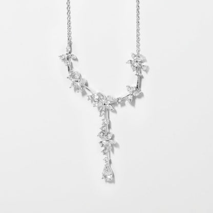 Silver crystal floral bridal necklace with starburst links and teardrop drop pendant