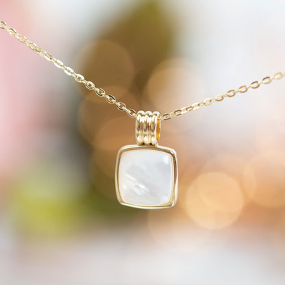 Square mother-of-pearl charm pendant necklace with gold bail and link chain