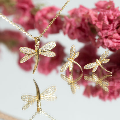 Gold dragonfly crystal earrings with curved hoop and pavé wings