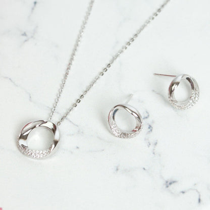 Sterling silver circle ring pendant necklace on chain, pavé outer ring