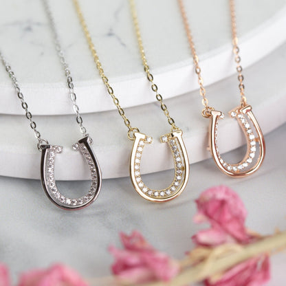 Horseshoe necklace set with silver, gold, and rose gold U pendants