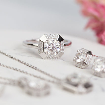 Lab-grown diamond cocktail ring flat lay with square halo and round center stone