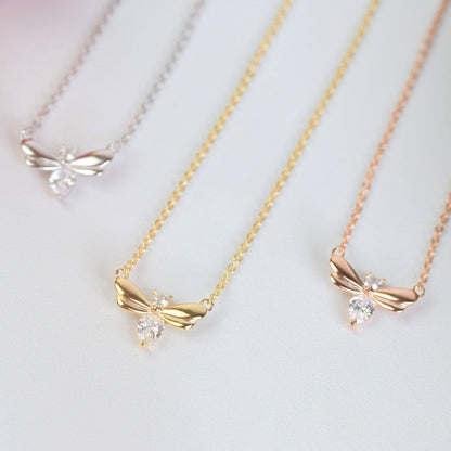 Pendant necklaces set in silver, gold, and rose gold with clear firefly stones