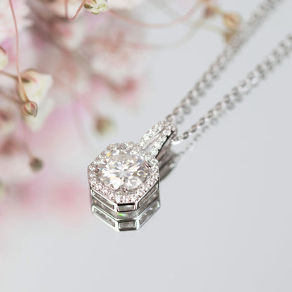 Lab-grown moissanite pendant necklace, round center stone in geometric halo bezel