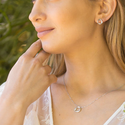 Sterling silver circle ring pendant necklace with pavé-edged hoop