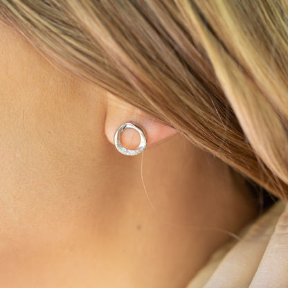 Sterling silver circle stud earrings with sparkling stone-inset ring