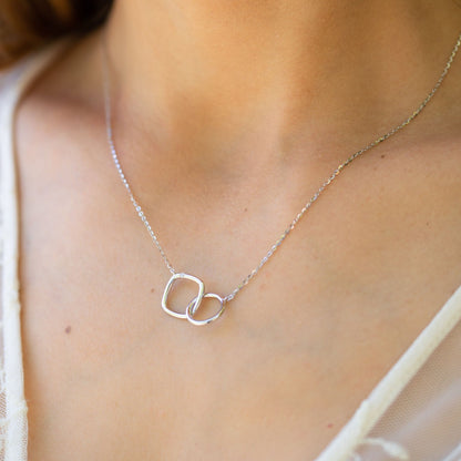 Silver infinity circle and square necklace with linked pendant and fine chain