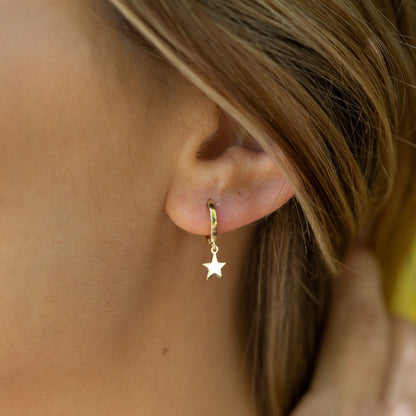 Silver-tone hoop earring with star charm dangle